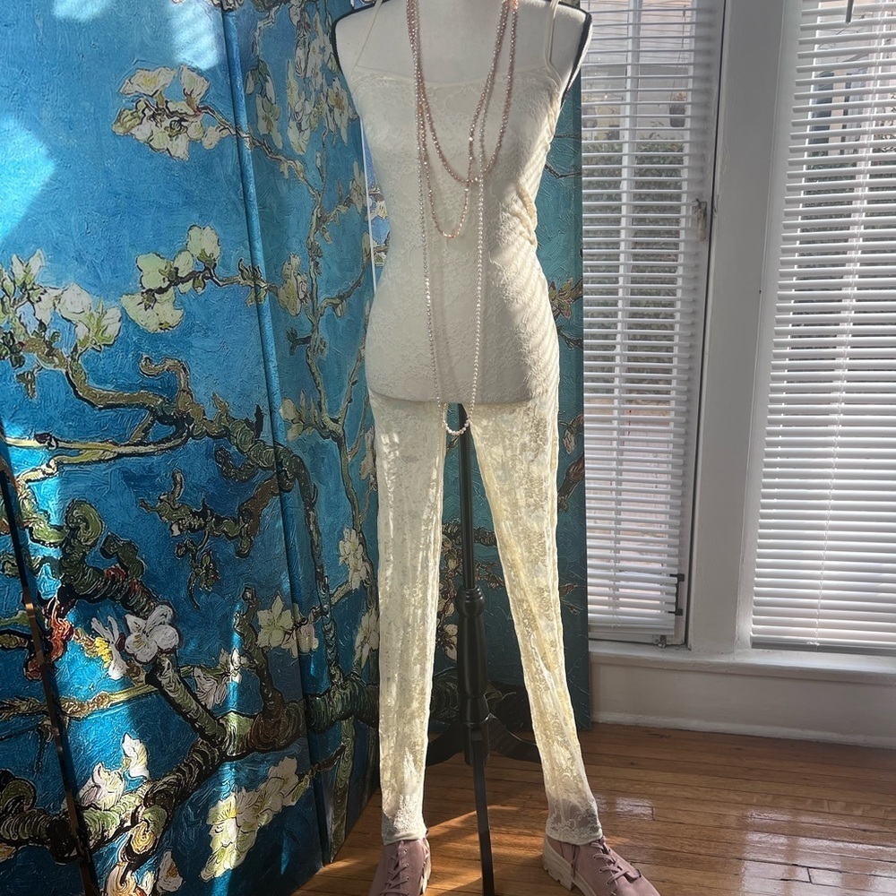 American apparel size medium/large lace spaghetti, strap, bodysuit.
